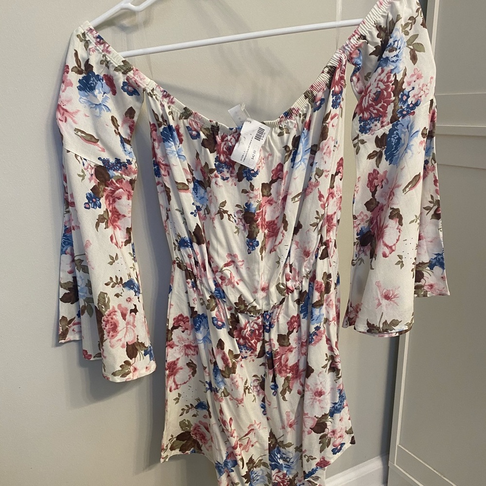 Bell Sleeve Creme/Floral Romper. NWT!